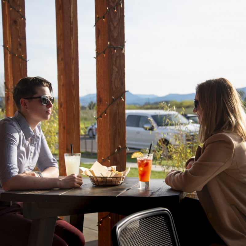 Enjoy outdoor dining at 4 Spirits Distillery and other restaurants around Corvallis, Oregon.