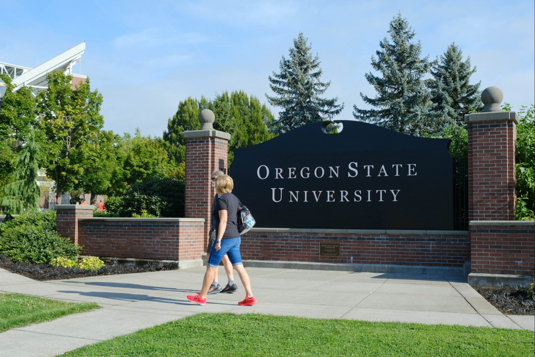 Oregon State University, Corvallis, Oregon - Large brick and marble monument with OSU's name on it, at the entrance to OSU.